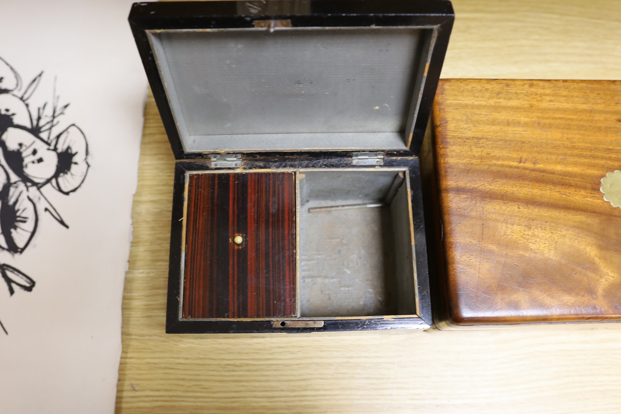 A Victorian mahogany brass bound sewing box, a mother of pearl and silver metal inlaid ebony tea caddy and another caddy, Ebony caddy 19 cms wide x 9 cms high